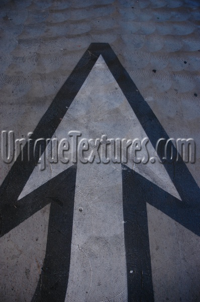 street symbol vertical triangular oblique     vehicle concrete white