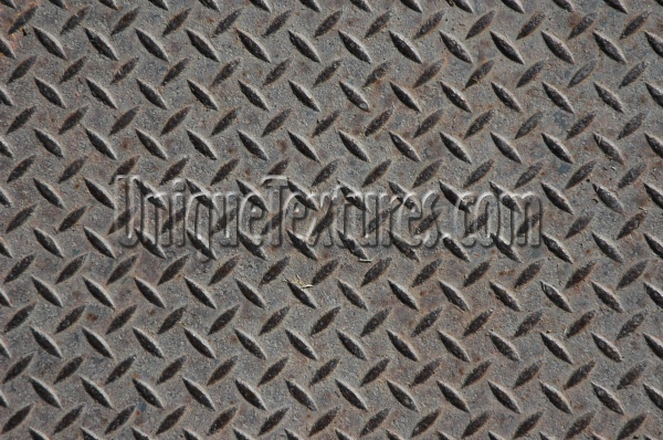 manhole diamonds pattern rusty industrial metal dark brown  