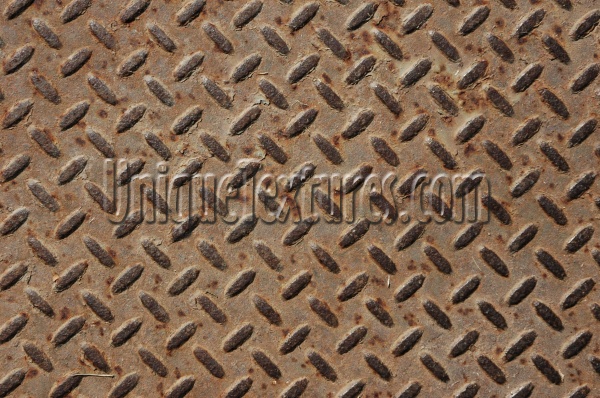 manhole diamonds pattern rusty industrial metal dark brown  