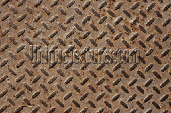 manhole diamonds pattern rusty industrial metal dark brown  