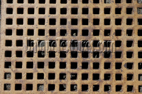 vent/drain square pattern rusty industrial metal dark brown multicolored black   