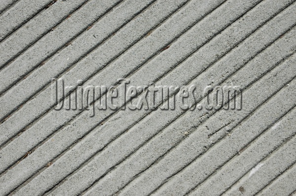 angled grooved industrial concrete gray floor    
