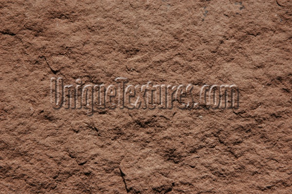 rough architectural stone dark brown