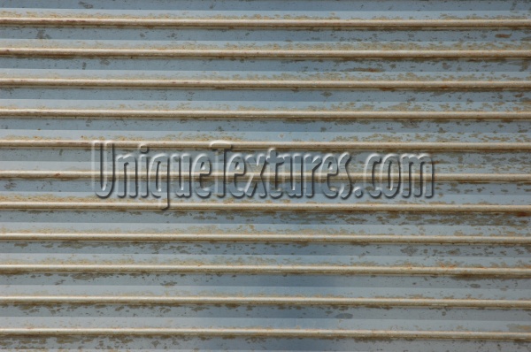 door horizontal grooved shadow rusty industrial metal gray  