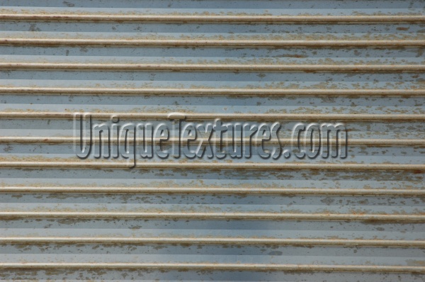 door horizontal grooved shadow rusty industrial metal gray  