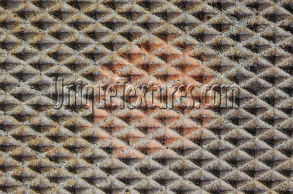 manhole diamonds pattern rusty industrial metal tan/beige  