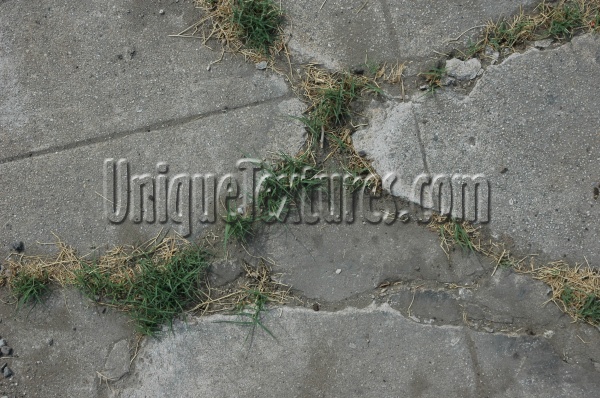 cracked/chipped industrial concrete gray floor   