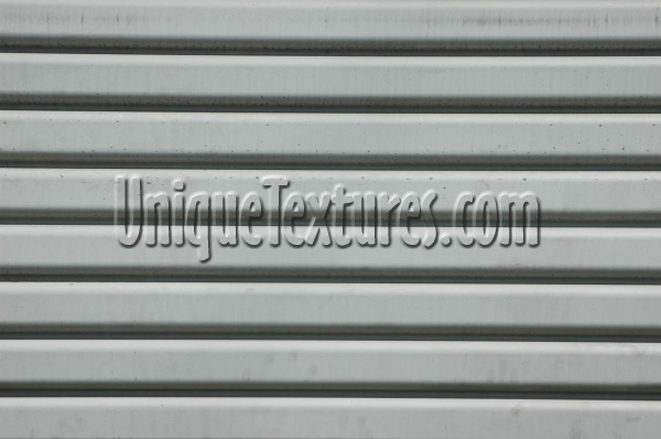 horizontal grooved weathered industrial door metal white  
