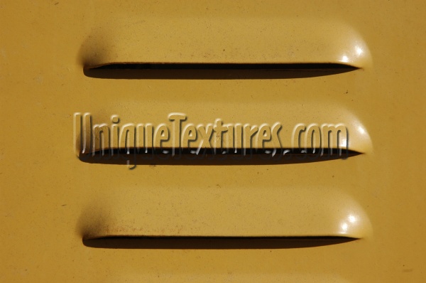 vent/drain horizontal pattern industrial metal yellow