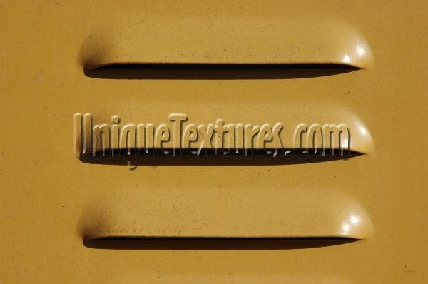 vent/drain horizontal pattern industrial metal yellow