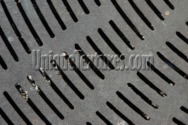 vent/drain pattern industrial metal dark brown