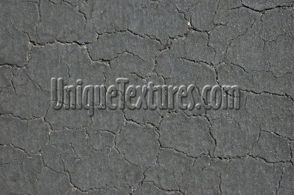 street cracked/chipped vehicle asphalt black