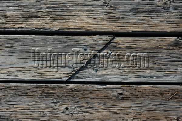 angled weathered marine wood  dark brown