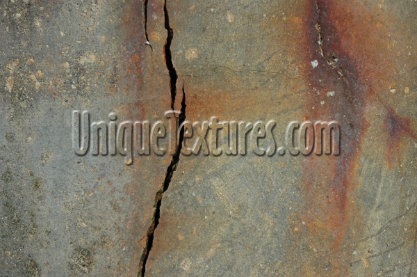 cracked/chipped rusty marine concrete gray floor