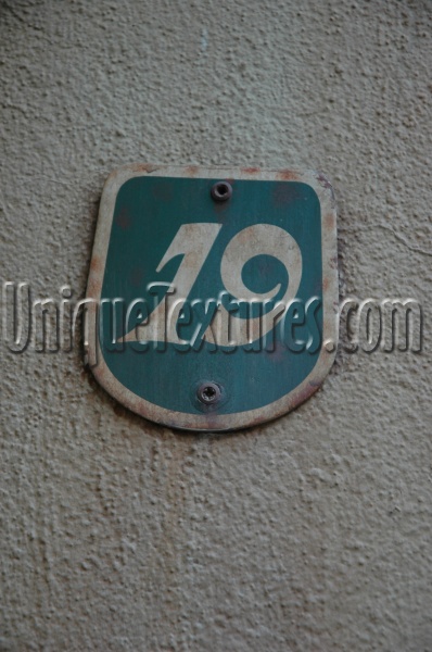 sign numerical architectural stucco/plaster metal multicolored   