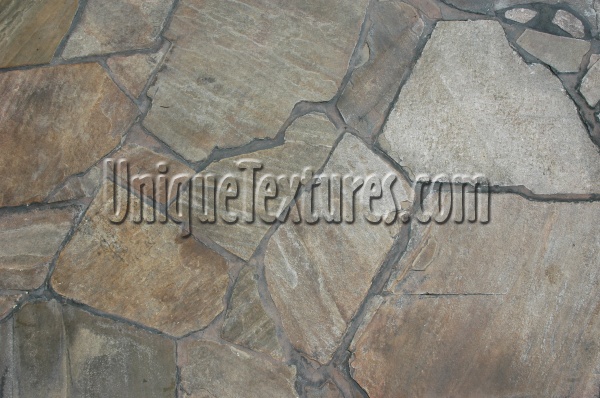 tan/beige stone architectural cracked/chipped random floor