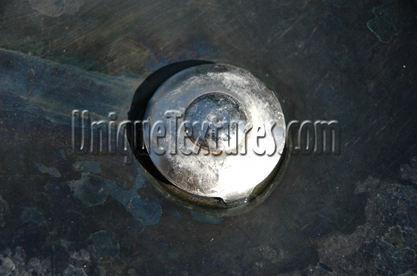 fixture vent/drain round wet shiny industrial metal metallic   
