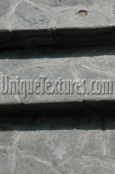 gray stone architectural shadow horizontal stairs
