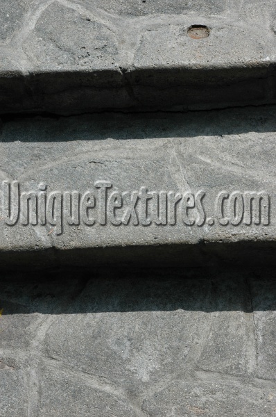 gray stone architectural shadow horizontal stairs