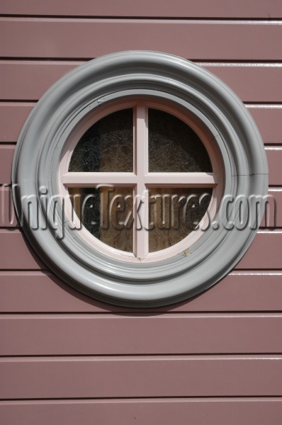 gray multicolored glass wood architectural round window