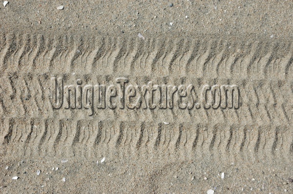 tan/beige sand natural vehicle marine pattern horizontal floor wheel