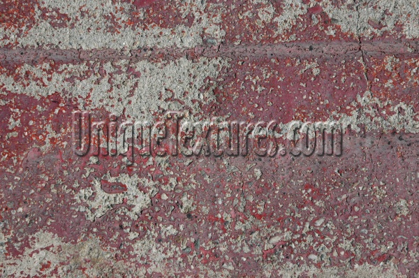 red gray paint concrete vehicle scratched weathered random street