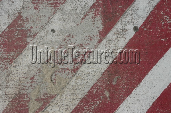 red white multicolored paint concrete vehicle scratched angled symbol street