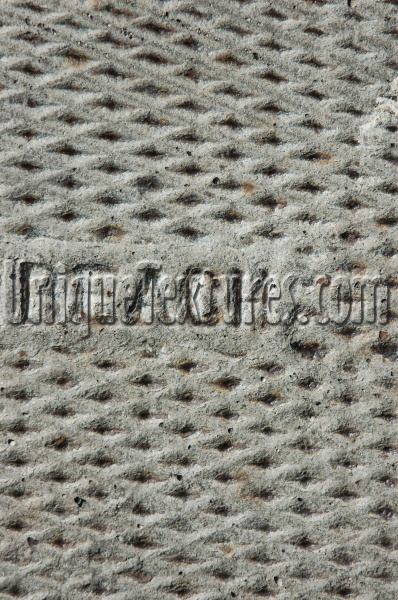 manhole diamonds textual marine concrete gray