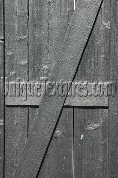 black paint wood architectural angled fence boards