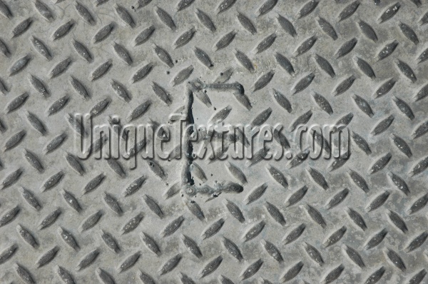 manhole diamonds pattern textual industrial metal gray
