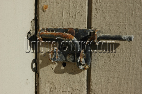 fixture boards fence shadow weathered rusty industrial wood metal gray