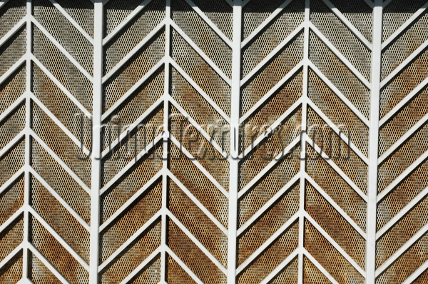 gray white metal architectural pattern angled fence