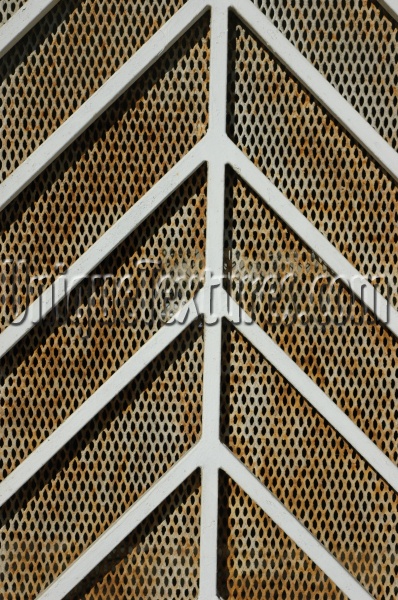 tan/beige white metal architectural rusty pattern angled fence