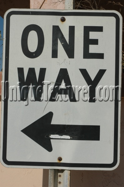 sign textual weathered vehicle metal white black