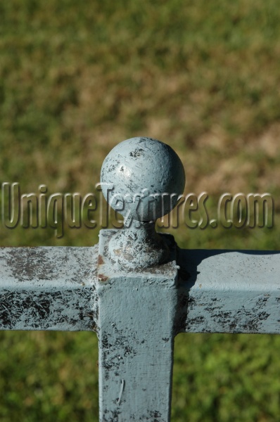 green metal architectural art/design weathered round oblique fence