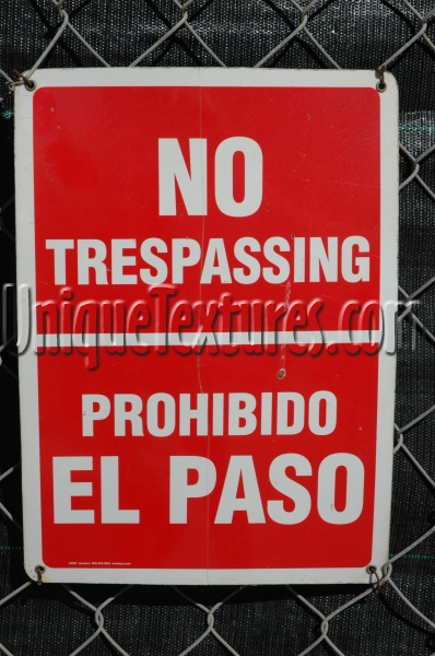 red white plastic architectural industrial textual sign