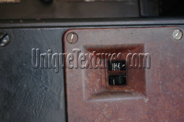 fixture fastener textual rusty vehicle industrial metal dark brown