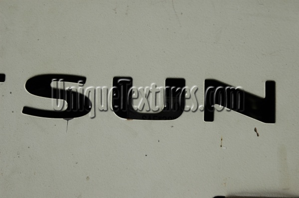 black white metal industrial art/design textual sign