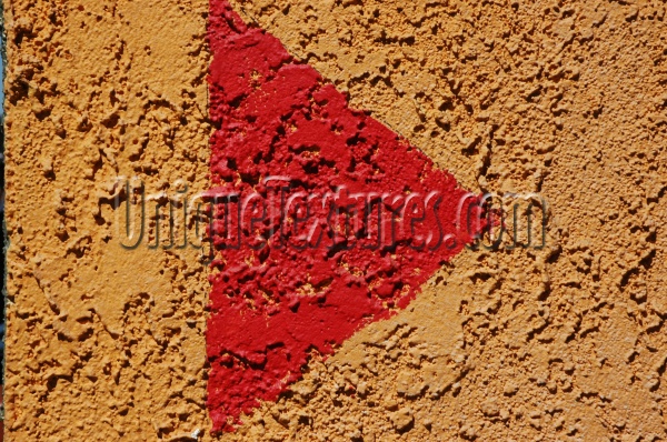 symbol wall triangular architectural stucco/plaster paint red yellow