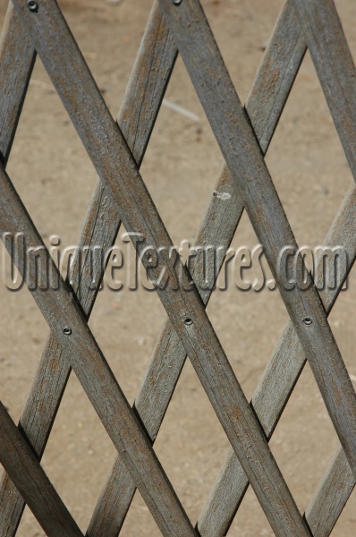 gray tan/beige wood architectural diamonds angled fence slats