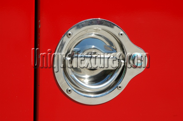 red metallic paint metal vehicle shiny round handle fixture