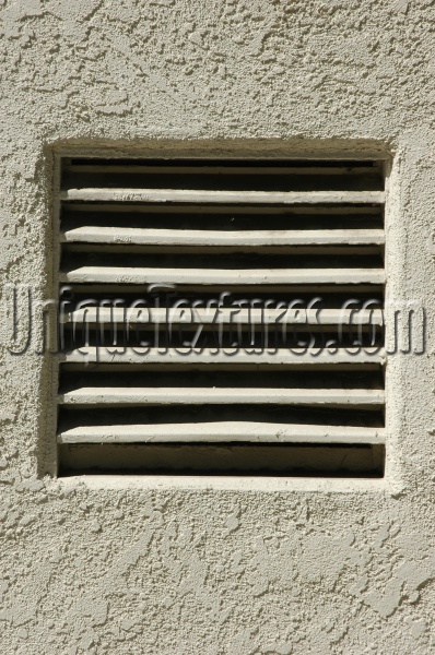 white metal stucco/plaster architectural shadow rectangular horizontal vent/drain