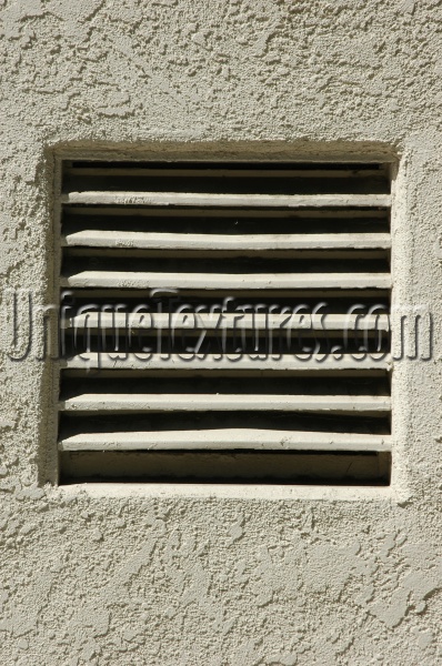 white metal stucco/plaster architectural shadow rectangular horizontal vent/drain