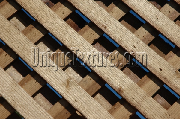 slats fence angled diamonds architectural wood dark brown