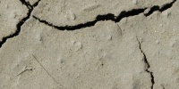 cracked/chipped weathered natural earth tan/beige floor    