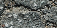 street cracked/chipped rough vehicle asphalt black   
