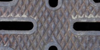 vent/drain pattern industrial metal dark brown  