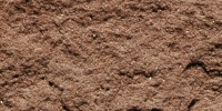 rough architectural stone dark brown