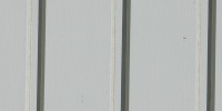 vertical pattern grooved architectural wood boards fence paint white