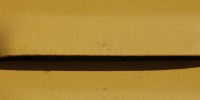 vent/drain horizontal pattern industrial metal yellow